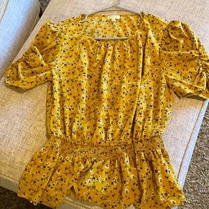 Mustard blouse with floral detail